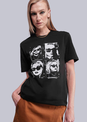 S=Person wearing a black t-shirt with graphic design on a plain background