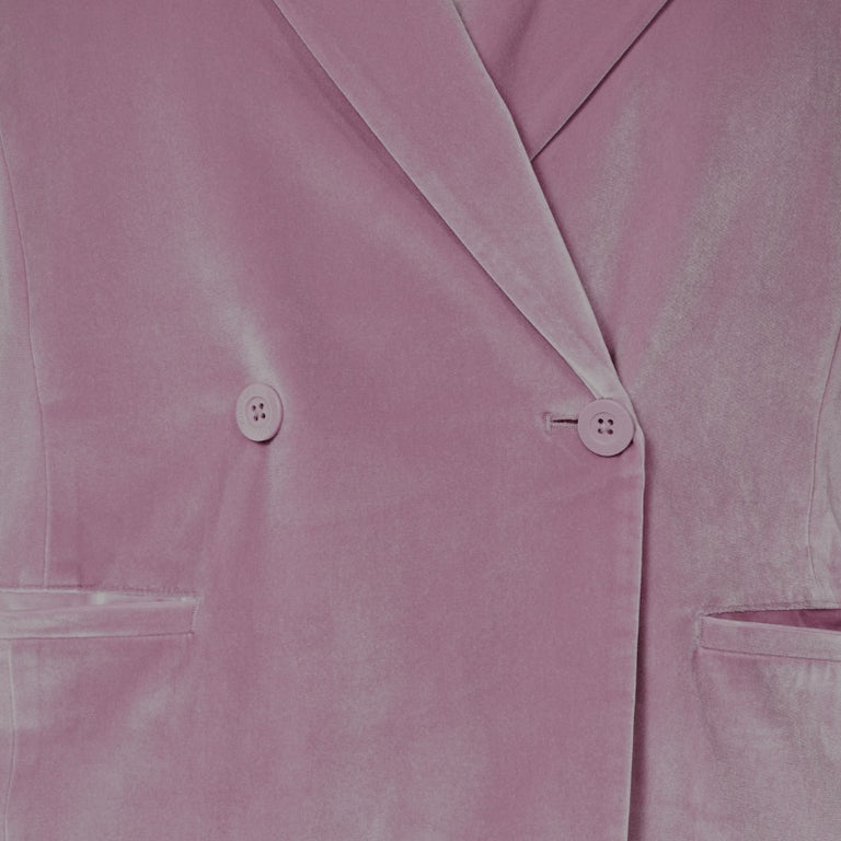 Close up of pink velvet blazer front.