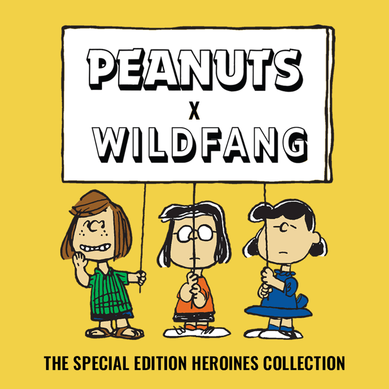 Yellow background with PEANUTS X WILDFANG logo and Peanuts characters Peppermint Patty, Marcie, and Lucy, with text underneath that reads The Special Edition Heroines Collection.