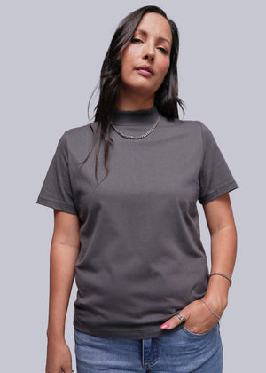 S=Woman wearing a gray t-shirt against a plain background