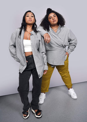 2 Models wearing The Essential Gingham Long Sleeve Oversized Convertible Button Up in Stripe Navy