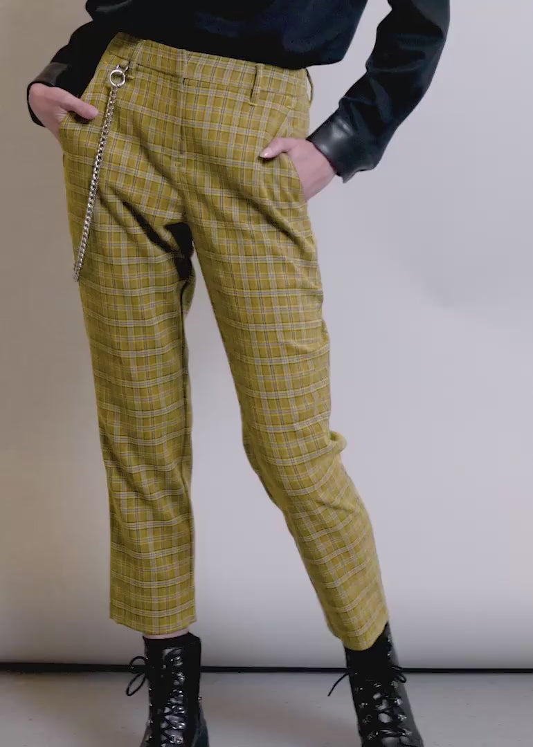 Video of two models wearing The Debbie Harry x Wildfang Slim Crop Pant and showing the fit and features