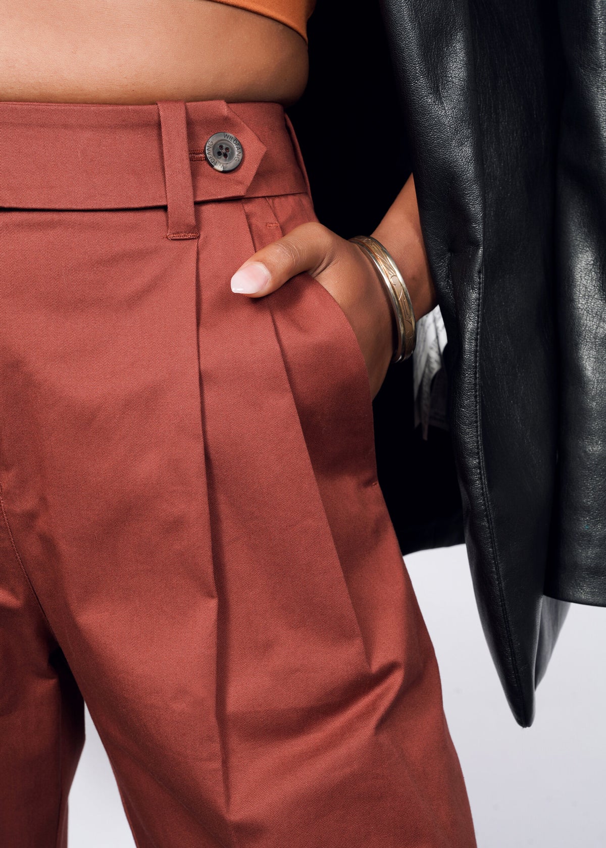 Model wearing The Essential Wide Leg Trouser in Cinnamon