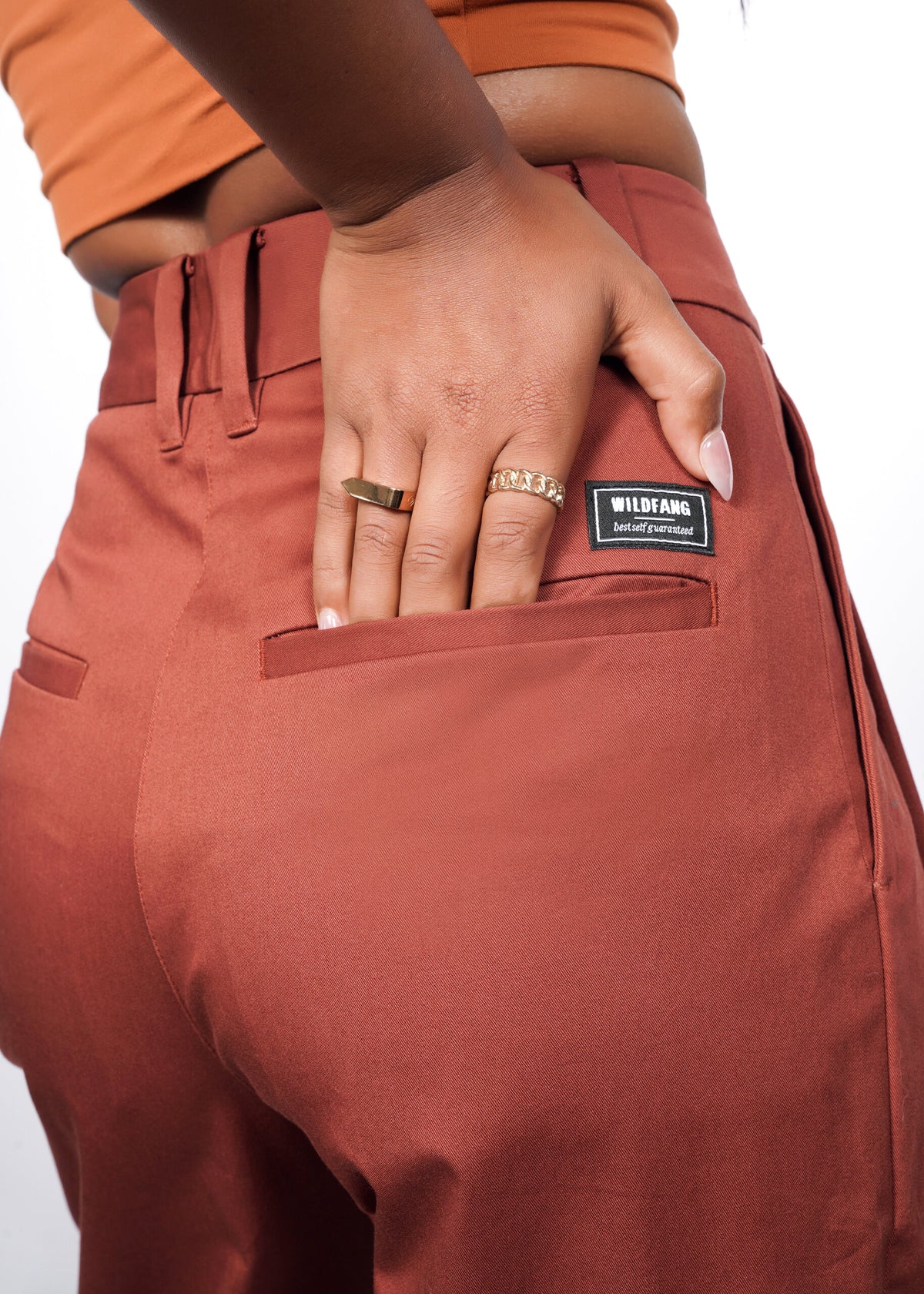 Model wearing The Essential Wide Leg Trouser in Cinnamon