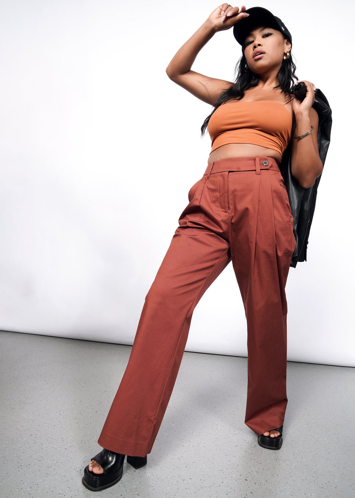 Model wearing The Essential Wide Leg Trouser in Cinnamon