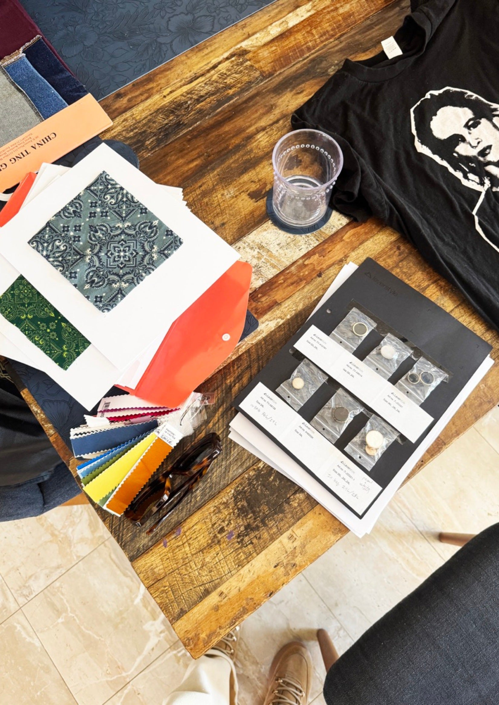 Wooden table with color and fabric swatches