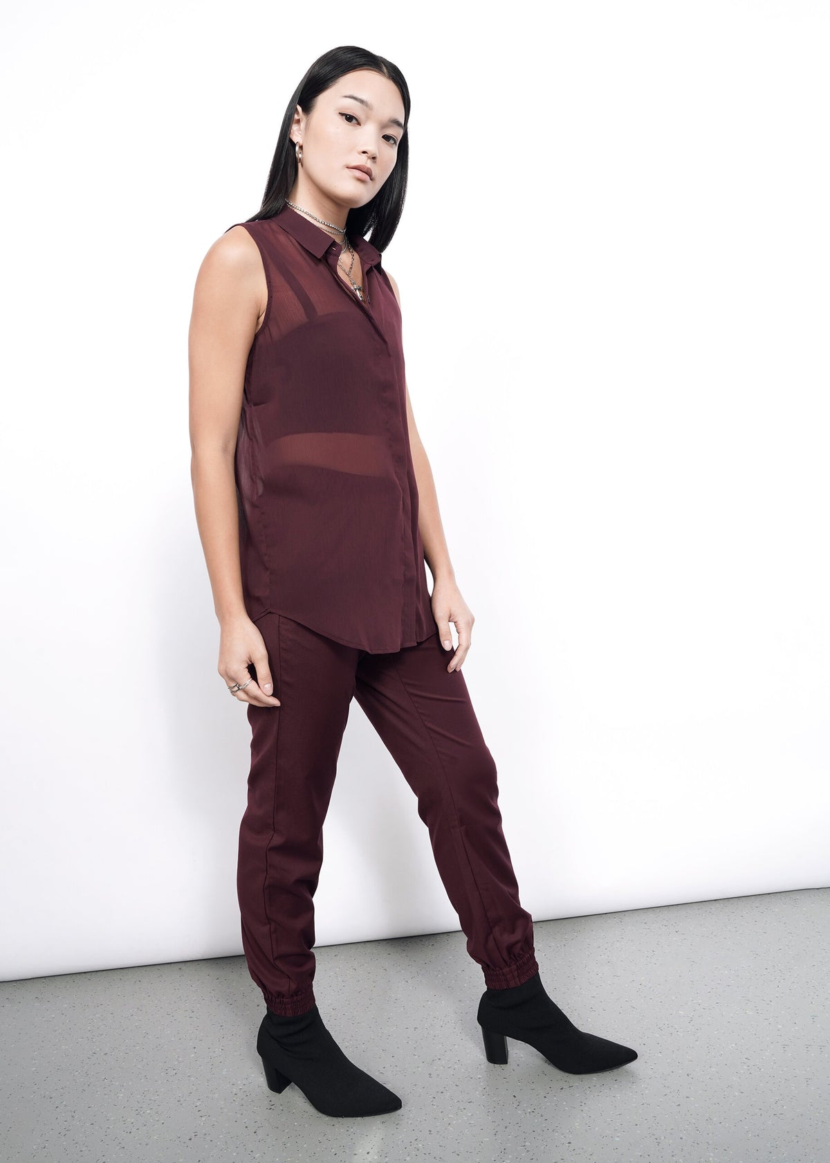 The Empower Sheer Sleeveless Button Up in Merlot
