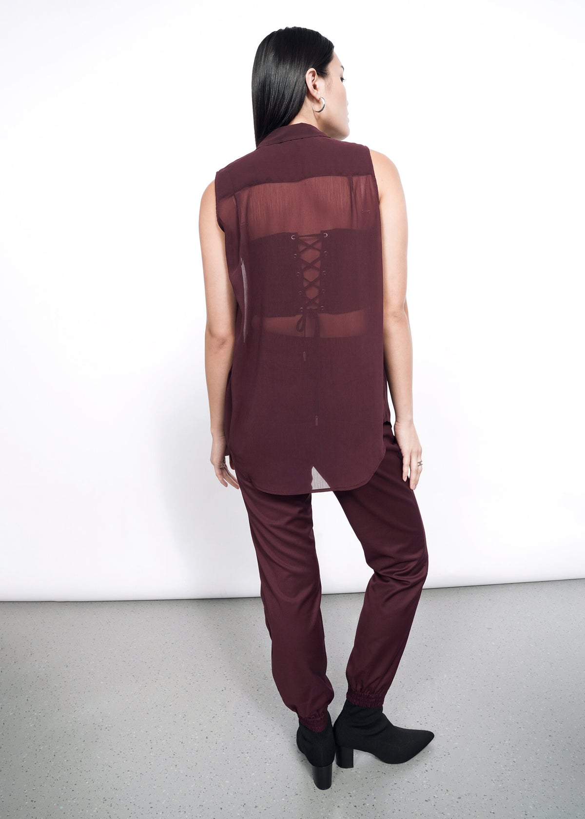 The Empower Sheer Sleeveless Button Up in Merlot