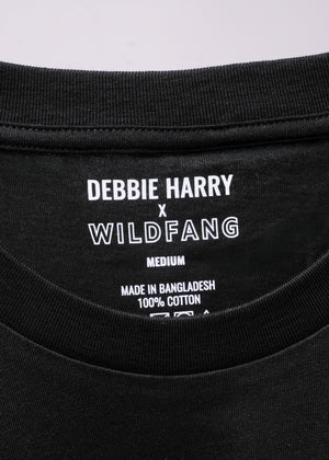 Close up of black tee label that reads DEBBIE HARRY X WILDFANG