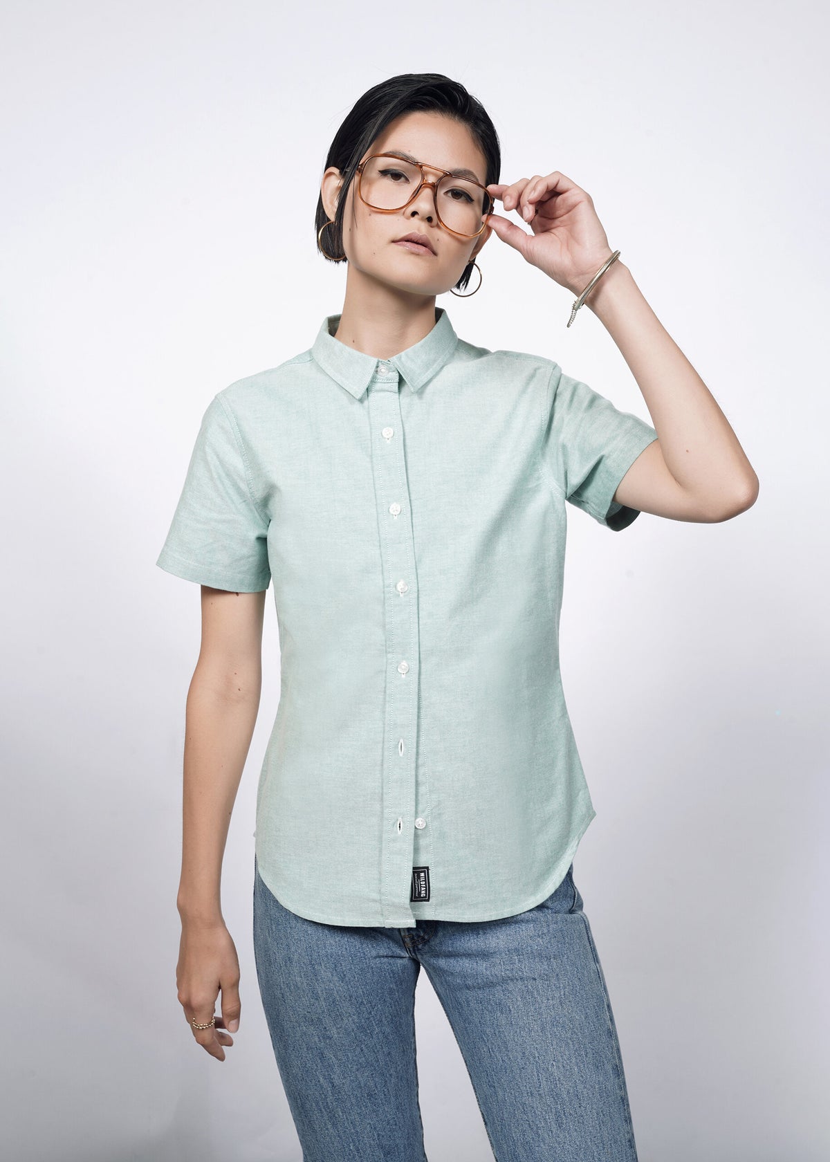 Model wearing The Essential Oxford Button Up in Emerald