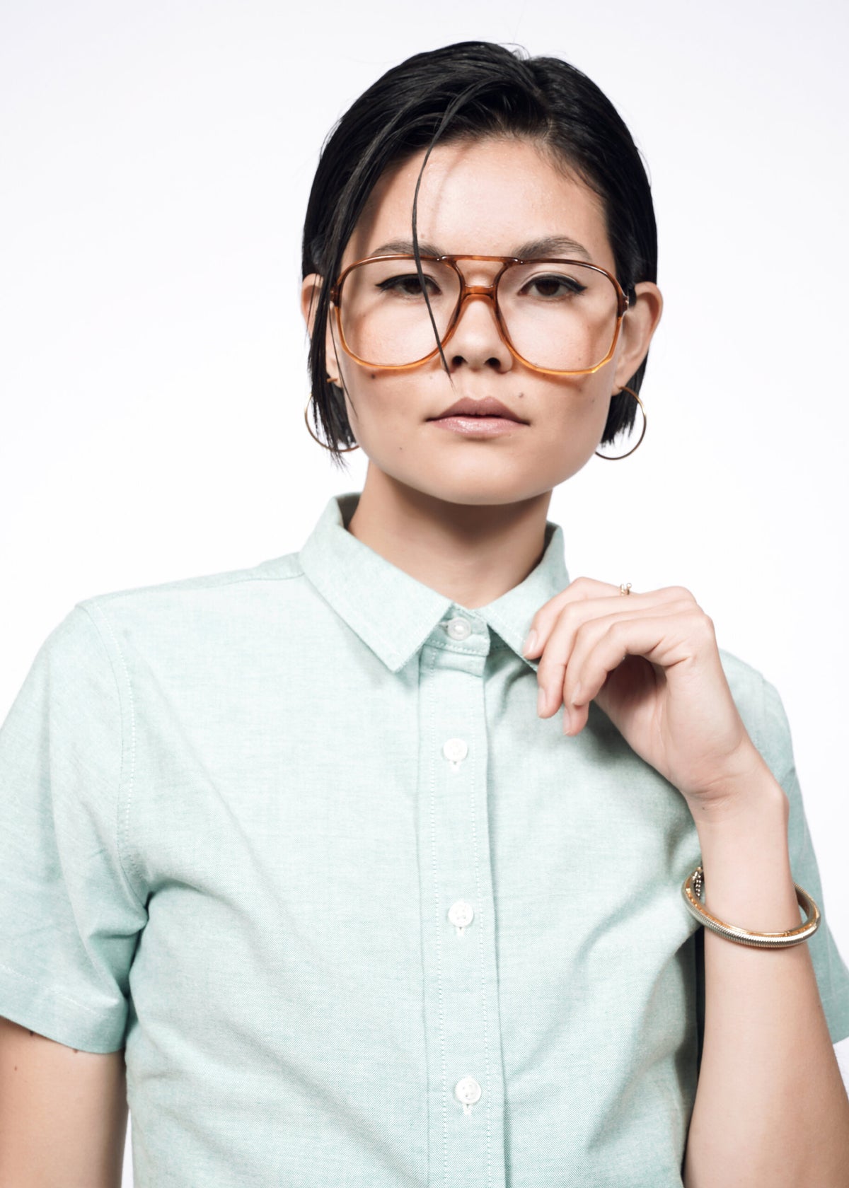 Model wearing The Essential Oxford Button Up in Emerald