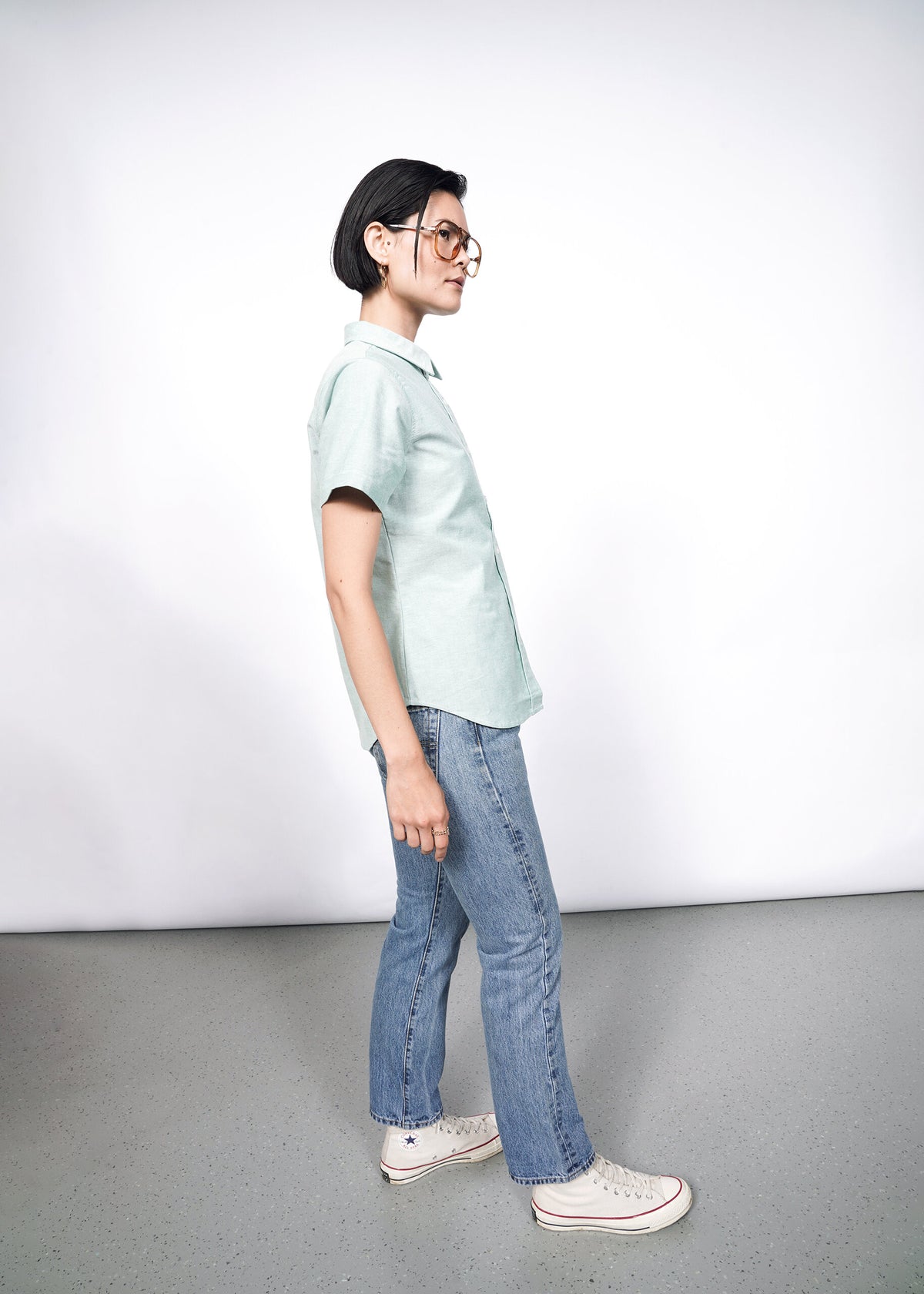 Model wearing The Essential Oxford Button Up in Emerald