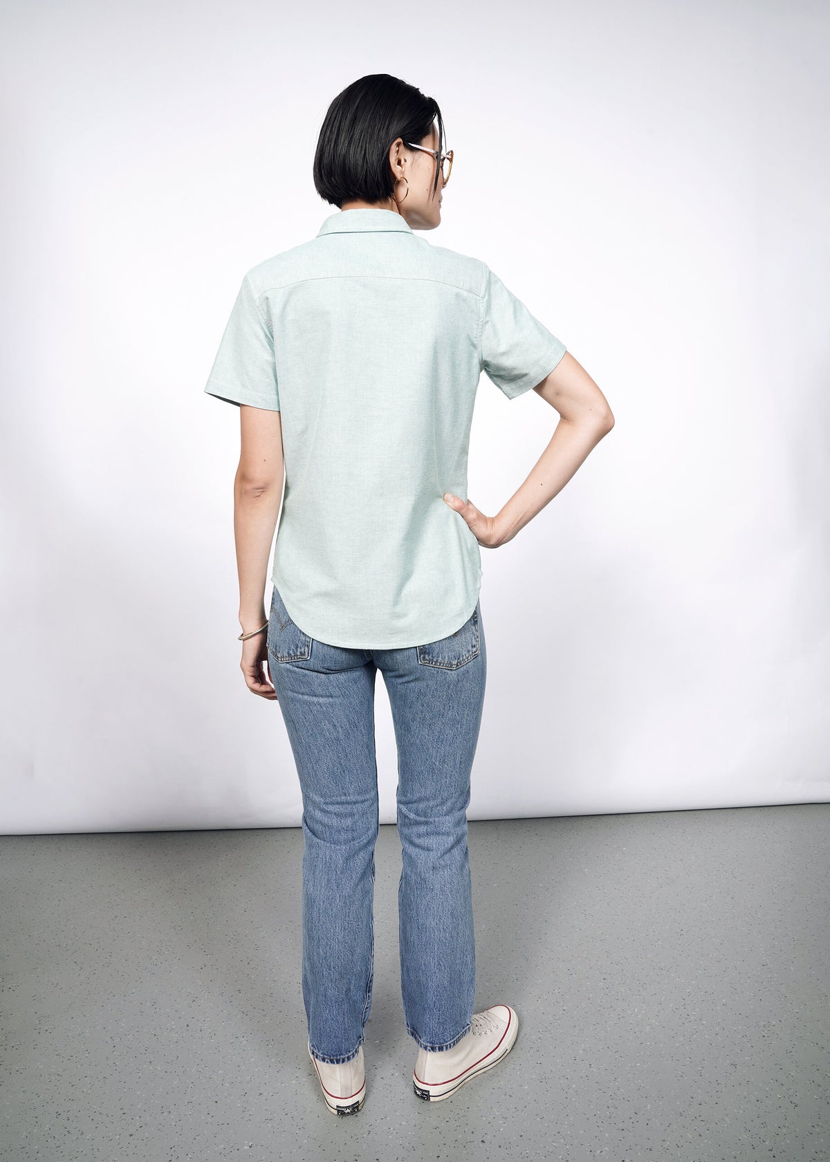 Model wearing The Essential Oxford Button Up in Emerald