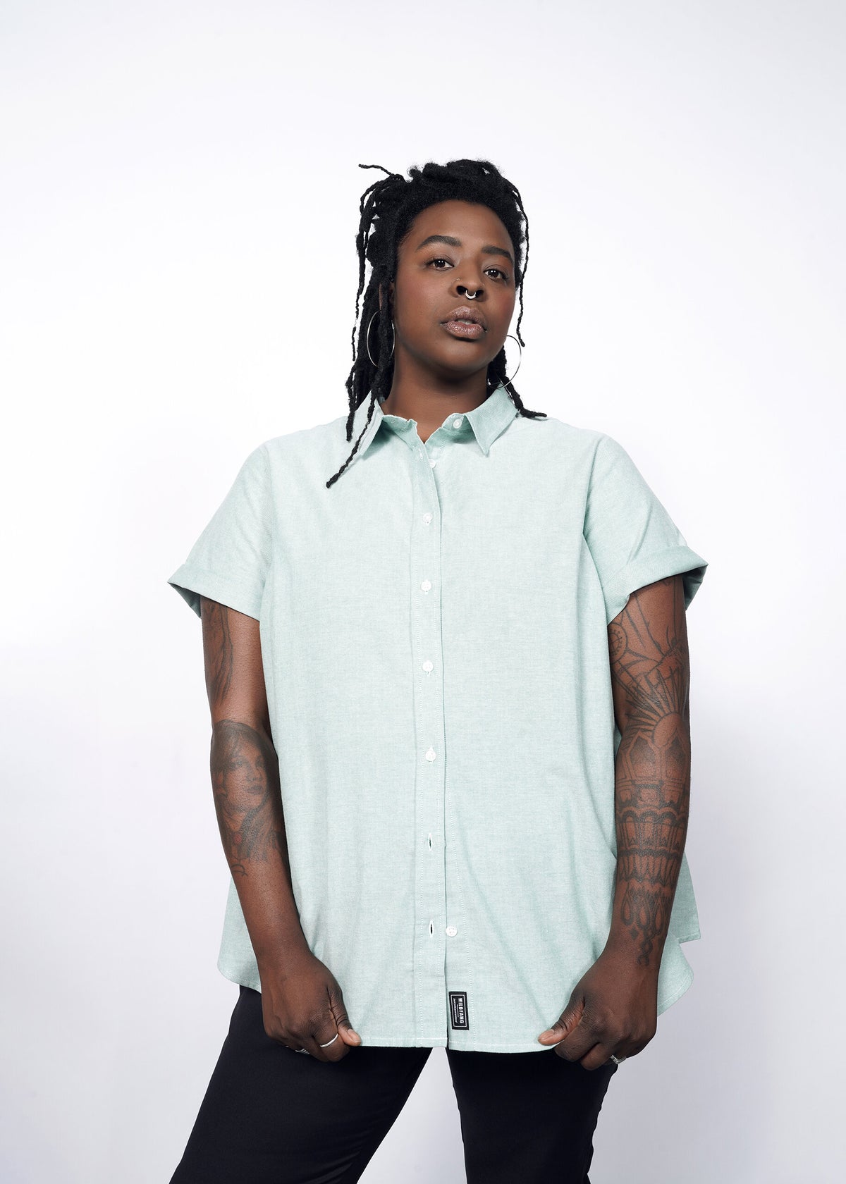 Model wearing The Essential Oxford Button Up in Emerald