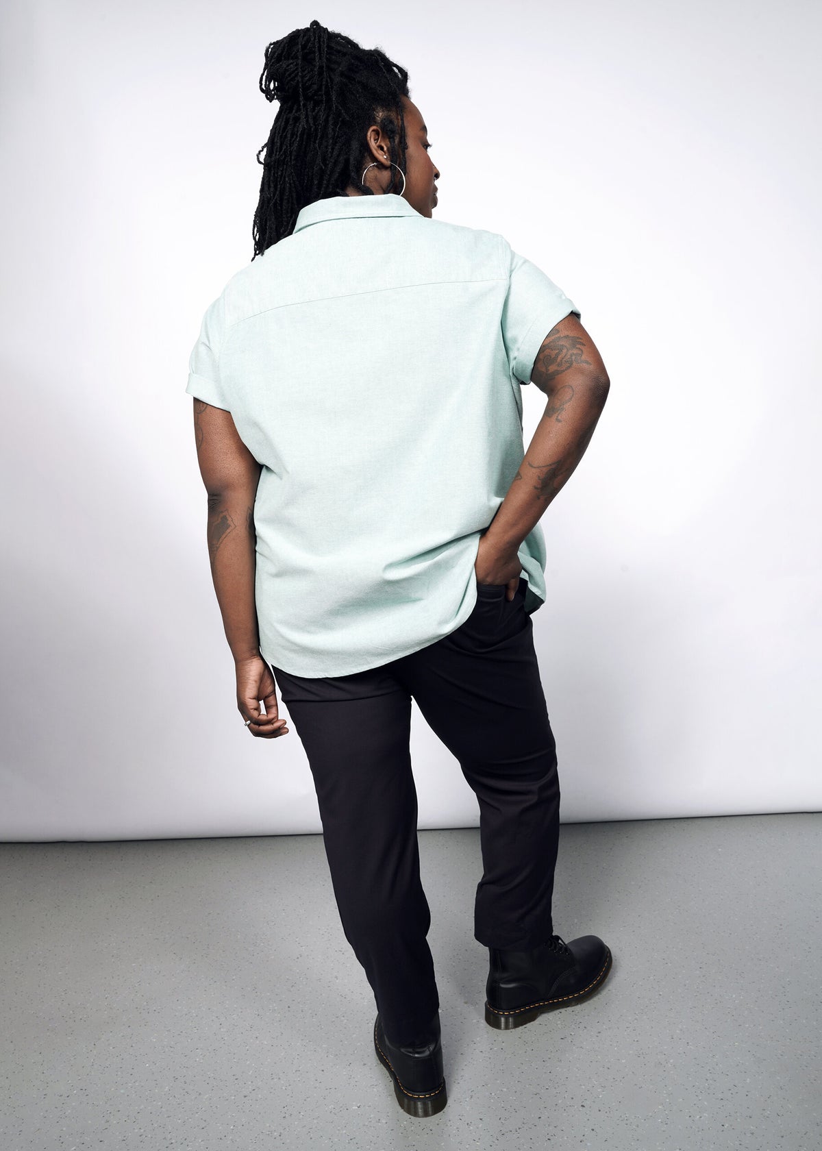 Model wearing The Essential Oxford Button Up in Emerald