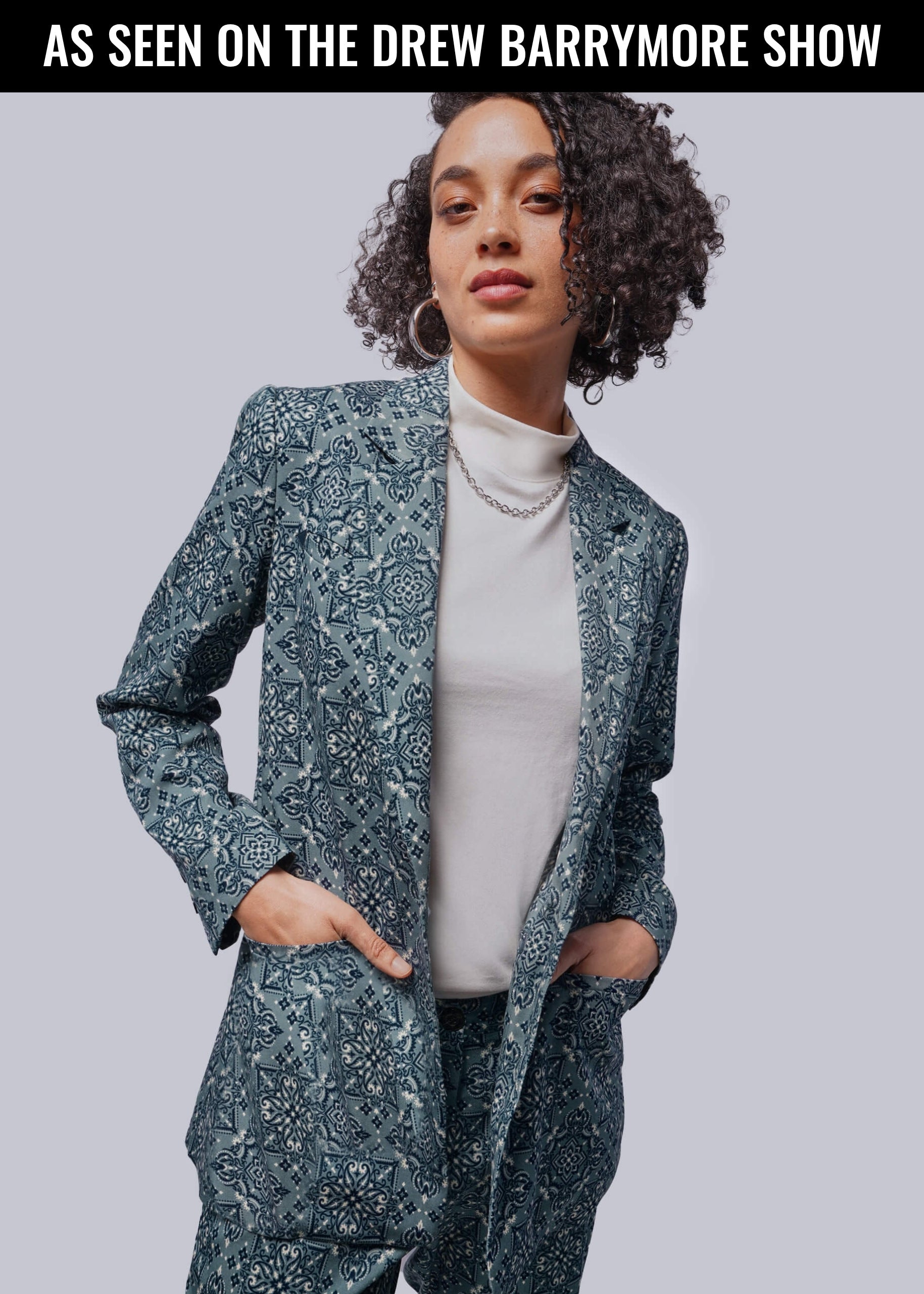 Model wearing Juliette Lewis X Wildfang Notch Lapel Blazer with promotional copy at the top that reads "AS SEEN ON THE DREW BARRYMORE SHOW"