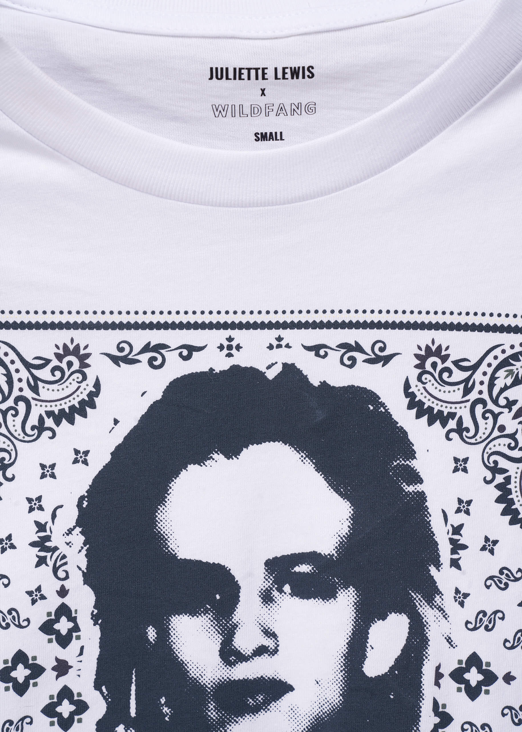 White t-shirt with a graphic of Juliette Lewis and bandana pattern, brand 'Wildfang' visible.