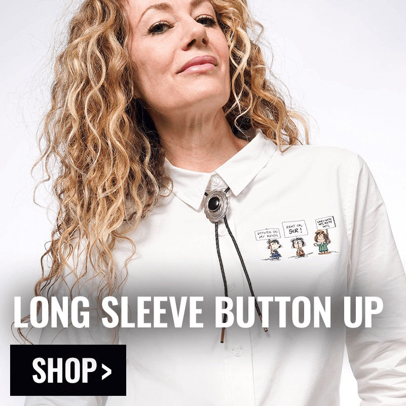 Close up of person modeling the PEANUTS X WILDFANG Long Sleeve Button Up with text overlay in left corner that reads LONG SLEEVE BUTTON UP and button that reads SHOP.