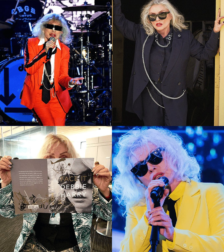 Grid of 4 images of Debbie Harry performing and posing wearing Wildfang suiting pieces over the years. Includes a red suit, a yellow suit, a patterned suit, and  a black suit from the Debbie Harry x Wildfang collection.