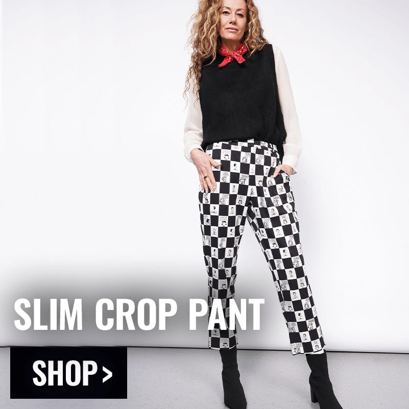 Person modeling the PEANUTS X WILDFANG Slim Crop Pant with overlay text in bottom left corner that reads SLIM CROP PANT and button that reads SHOP.