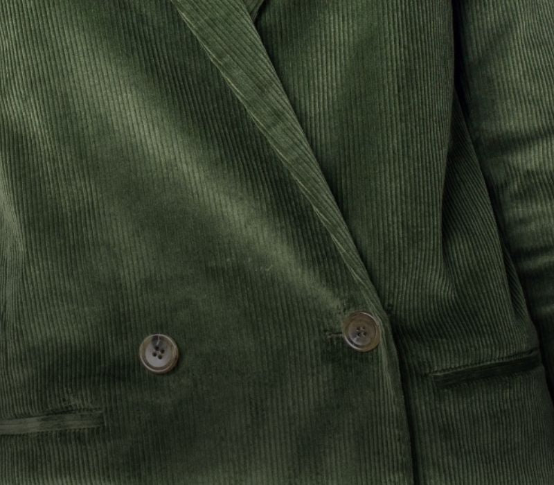 Close up of green corduroy blazer