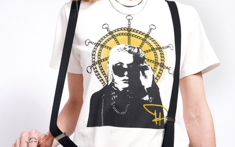 Close up of model wearing suspenders and Debbie Harry x Wildfang tee.