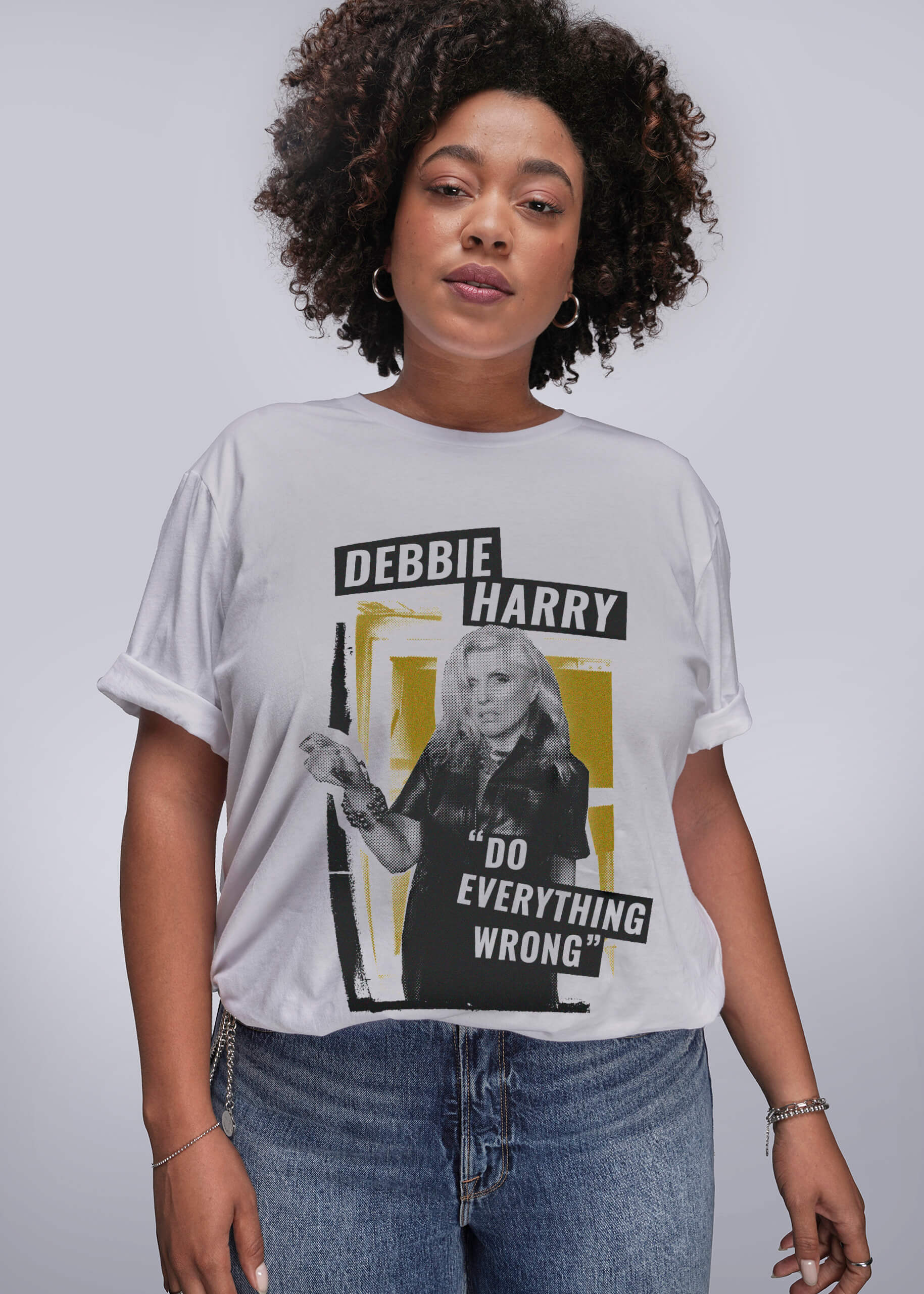 1X=Person wearing a t-shirt with a graphic design featuring Debbie Harry and text.