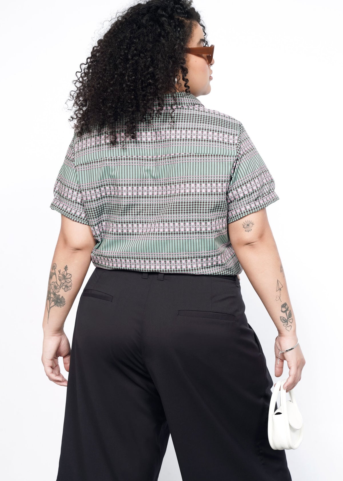 Back image of model wearing the Essential Button Up in Gingham Sage in size 1X