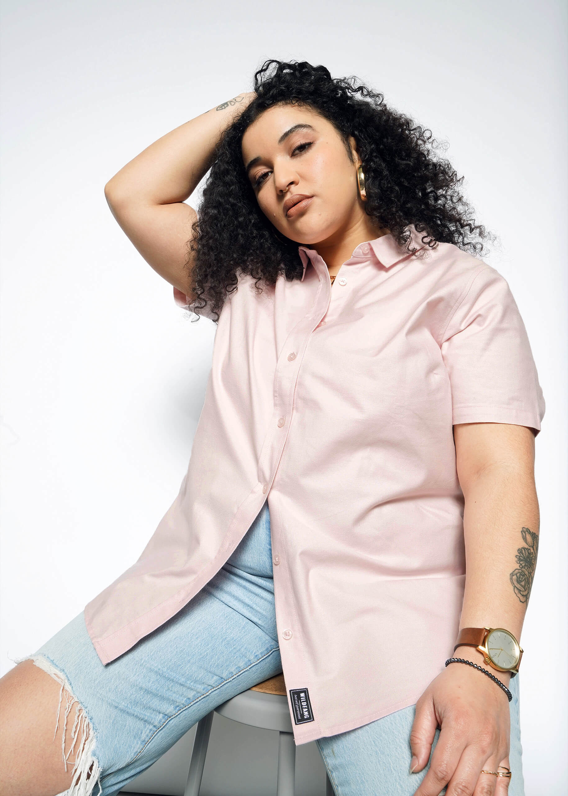 Front view of extended sizing model in Wildfang Essential Oxford Button Up in Blush