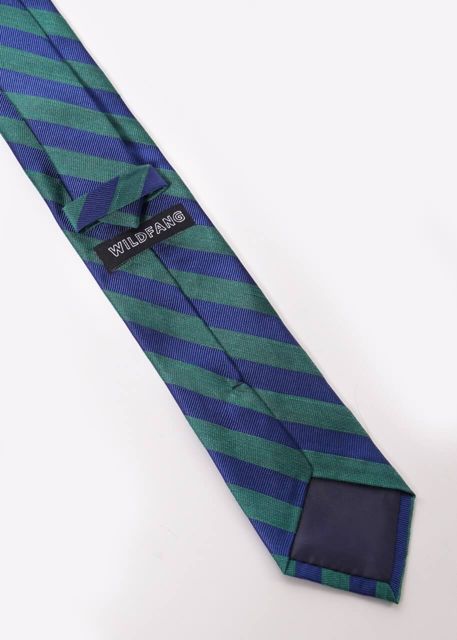Back of striped green and blue tie on white background showing WILDFANG label.