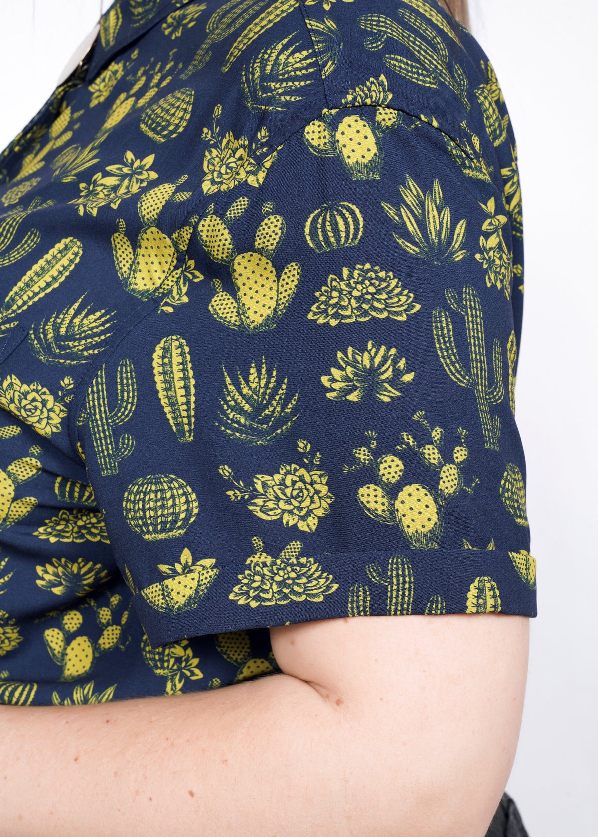 Closeup of The Empower Button Up in Blue Cactus Dijon
