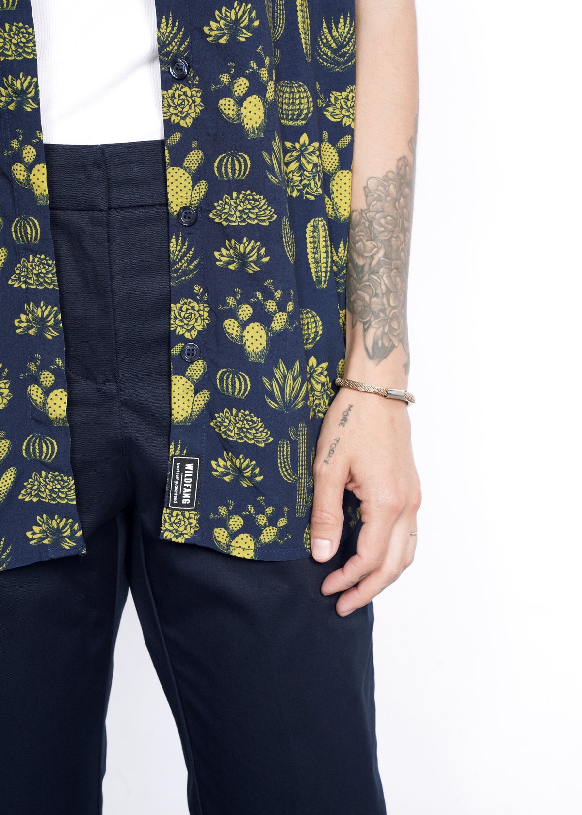 Closeup of The Empower Button Up in Blue Cactus Dijon