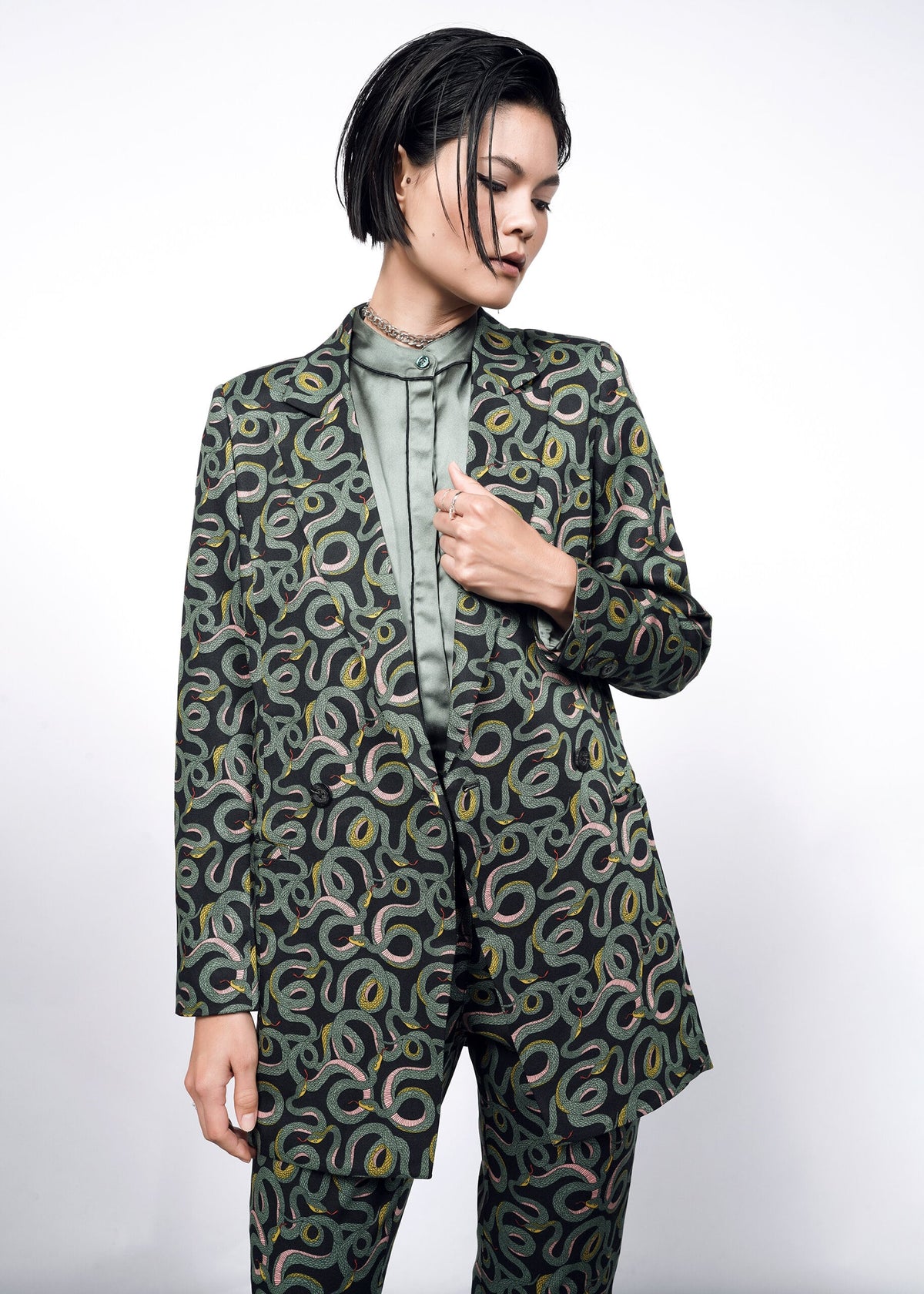 Model wearing the The Empower Double Breasted Blazer in Serpentine Black