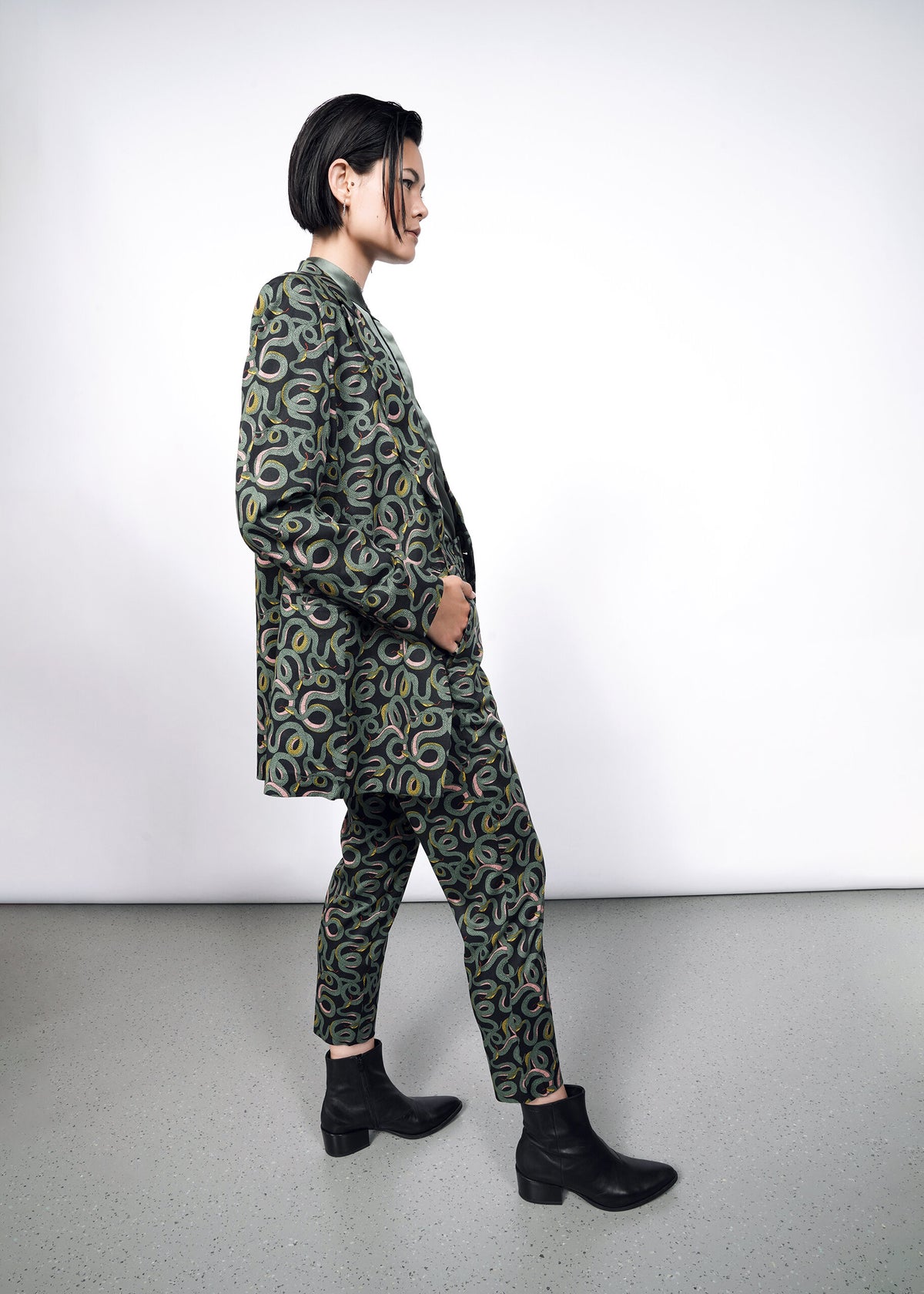 Model wearing the The Empower Double Breasted Blazer in Serpentine Black