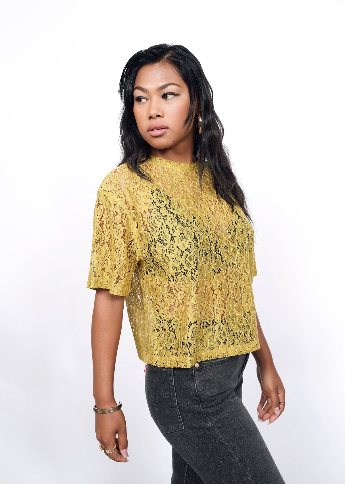 Model wearing The Empower Lace Boxy Blouse in Dijon