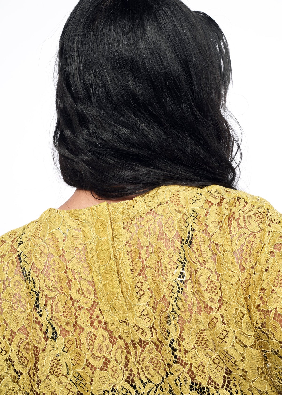 Model wearing The Empower Lace Boxy Blouse in Dijon