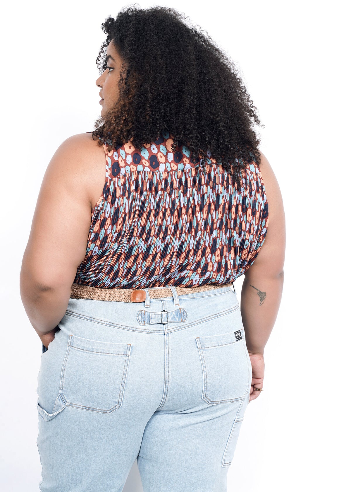 Back shot of The Empower Plisse Sleeveless Button Up