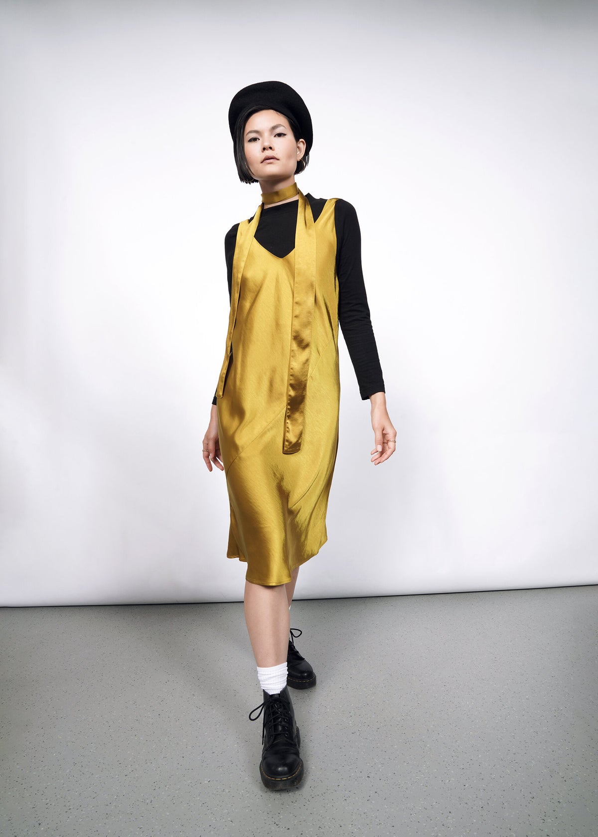 Model wearing The Empower Satin Adjustable Slip Dress in Dijon