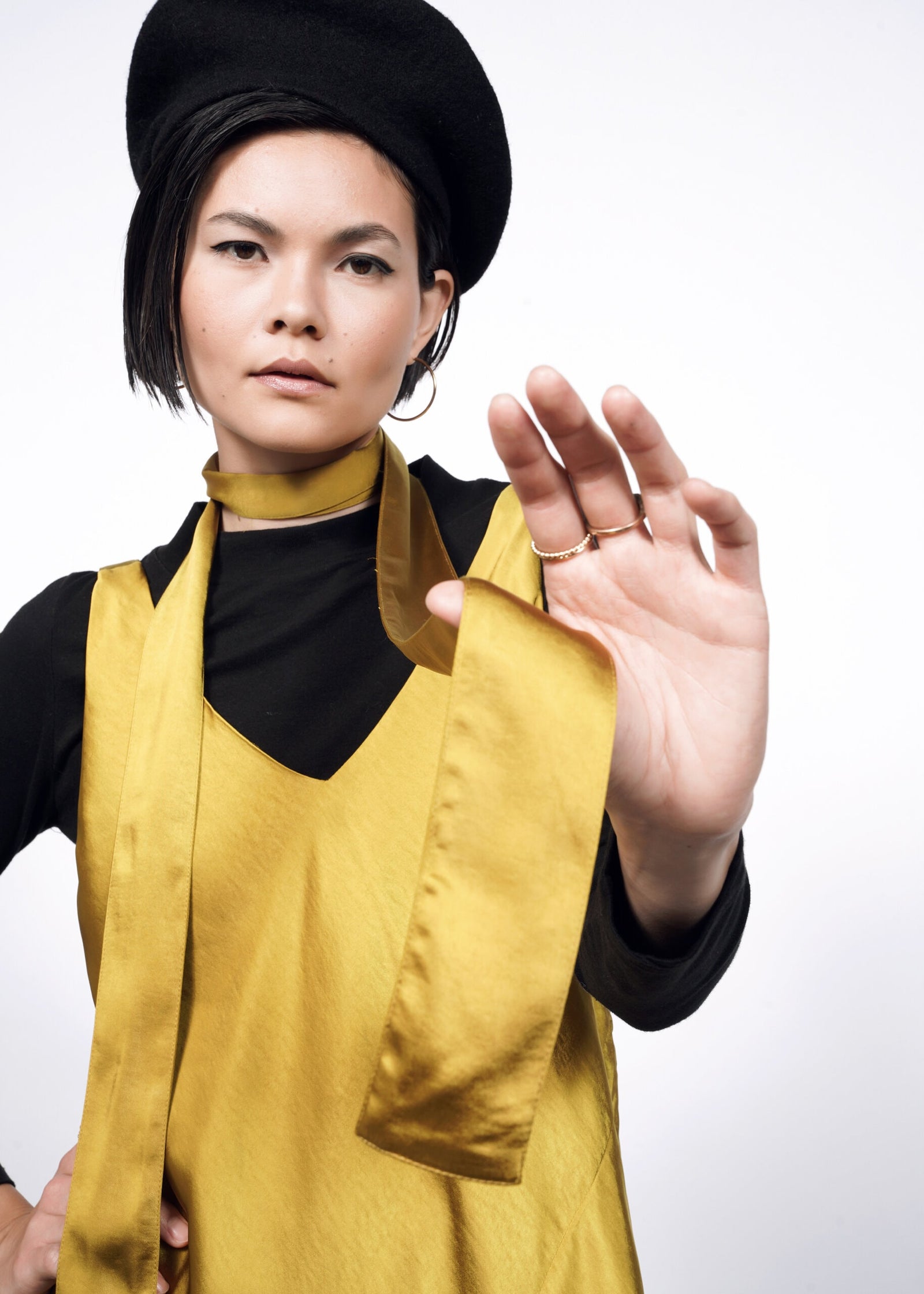 Model wearing The Empower Satin Adjustable Slip Dress in Dijon