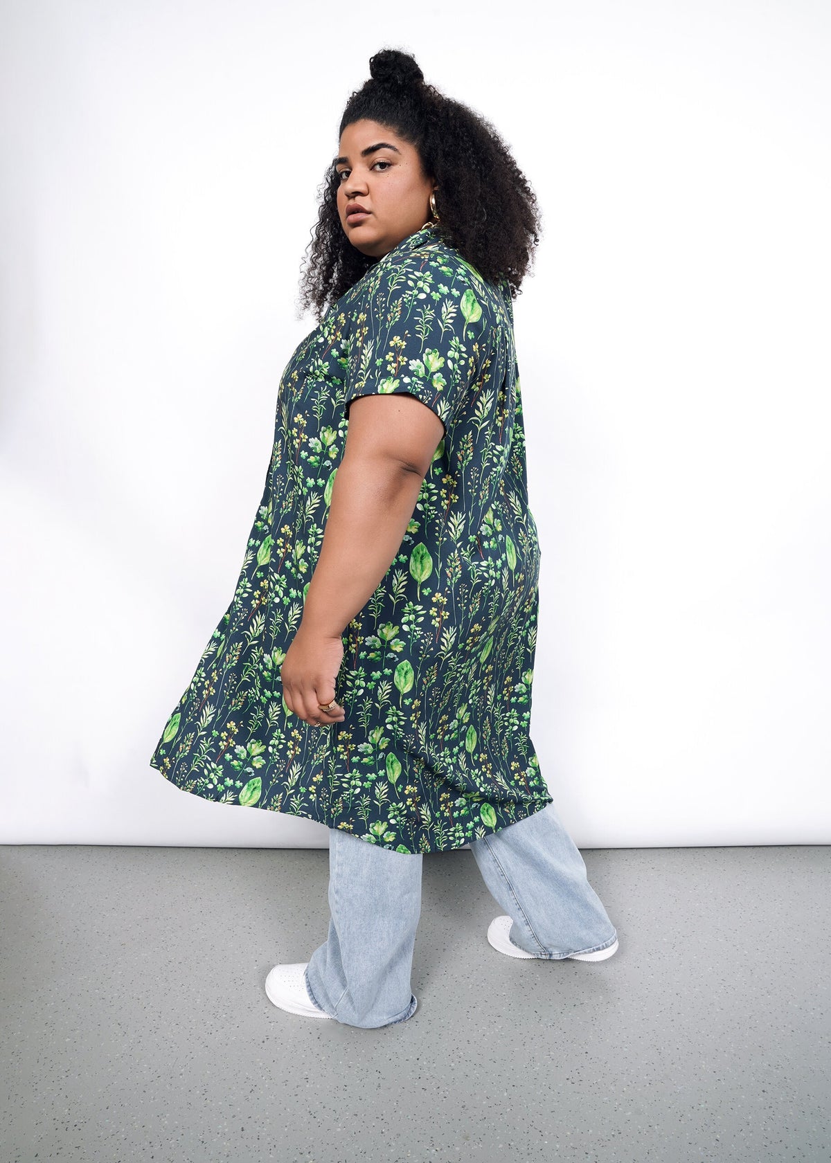 Model wearing The Empower Shirt Dress in Leaf Navy