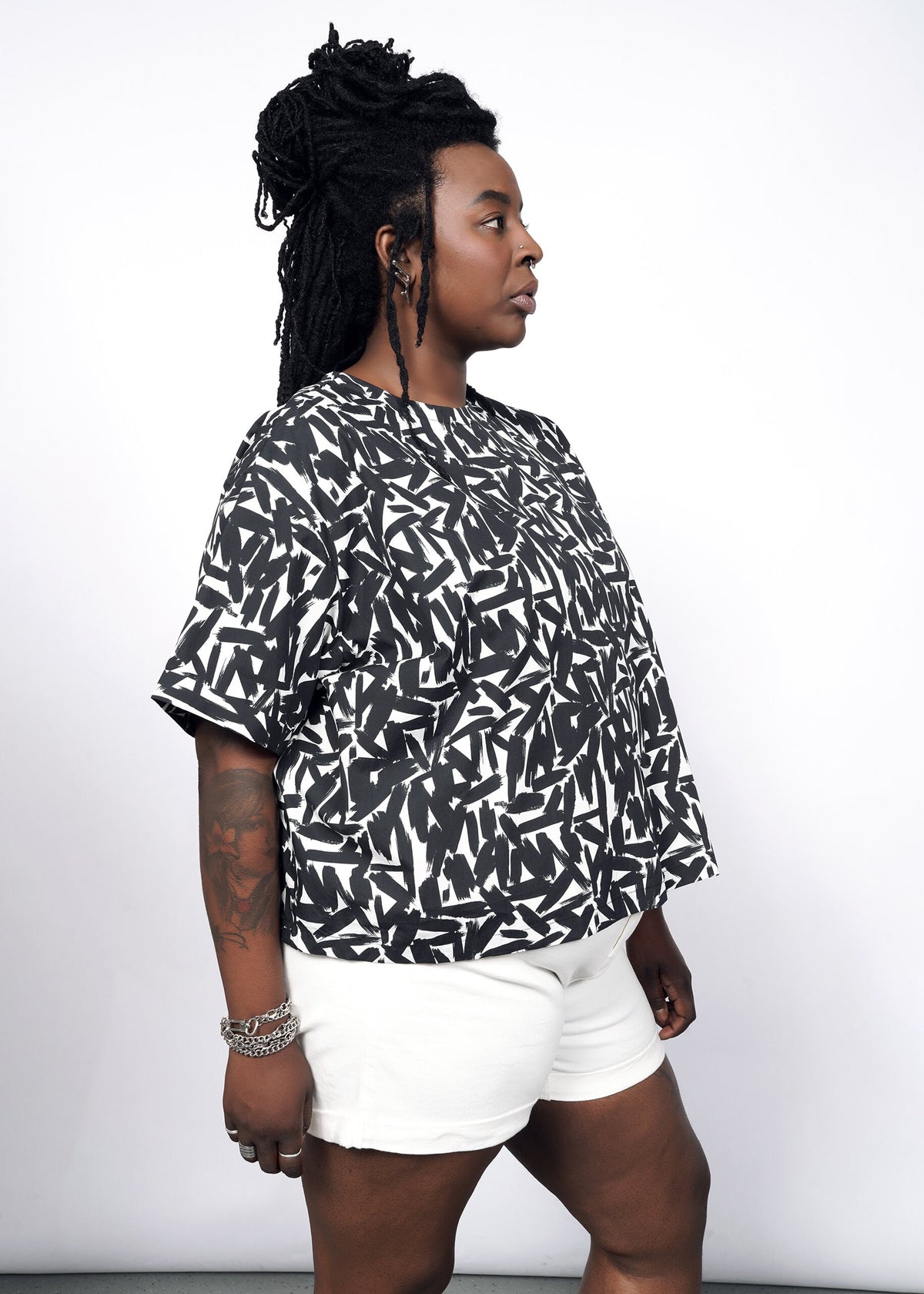 Model wearing The Essential Boxy Top in Paint Stroke White