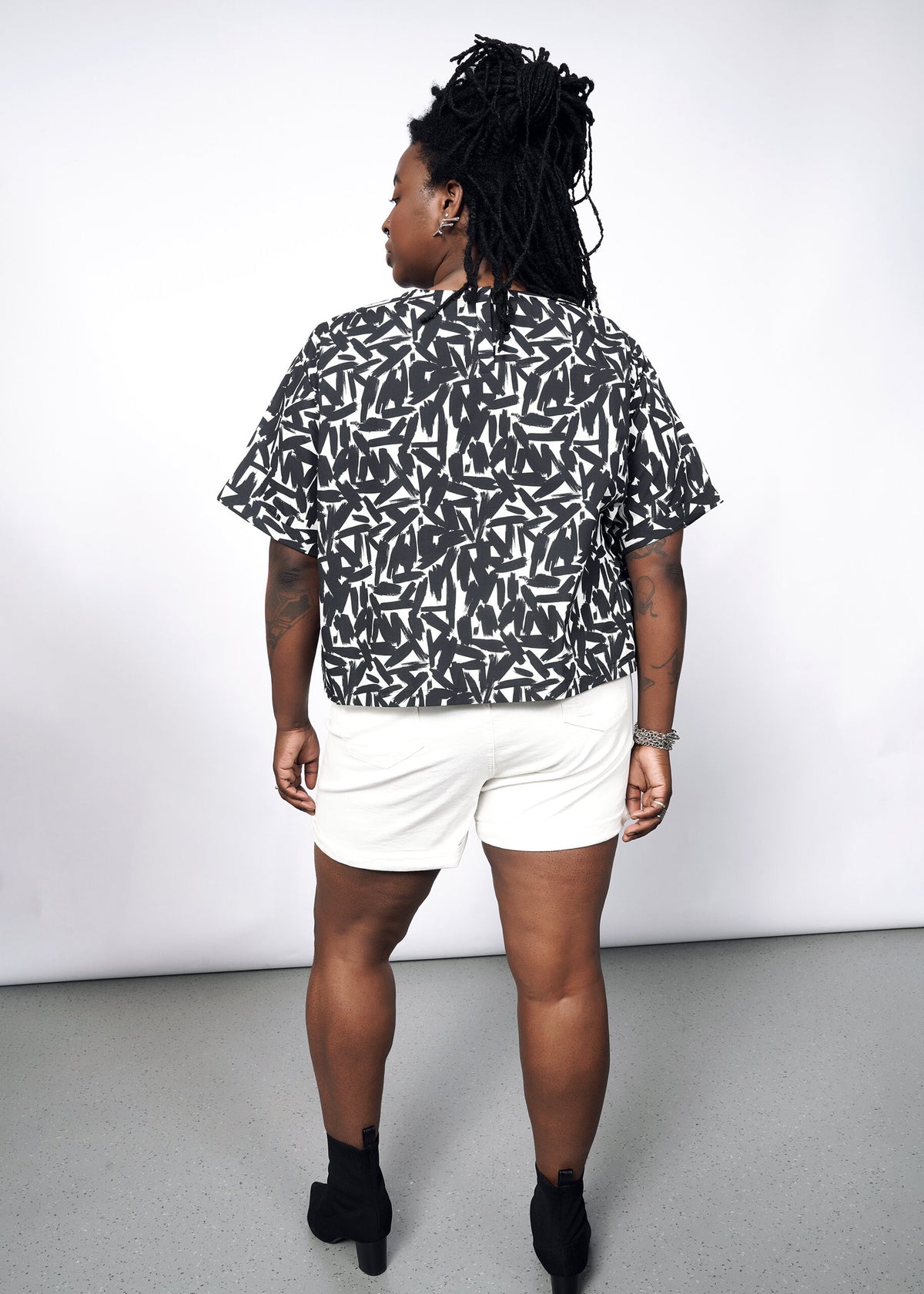 Model wearing The Essential Boxy Top in Paint Stroke White