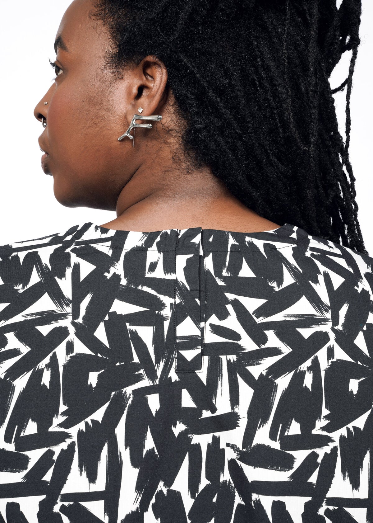 Model wearing The Essential Boxy Top in Paint Stroke White
