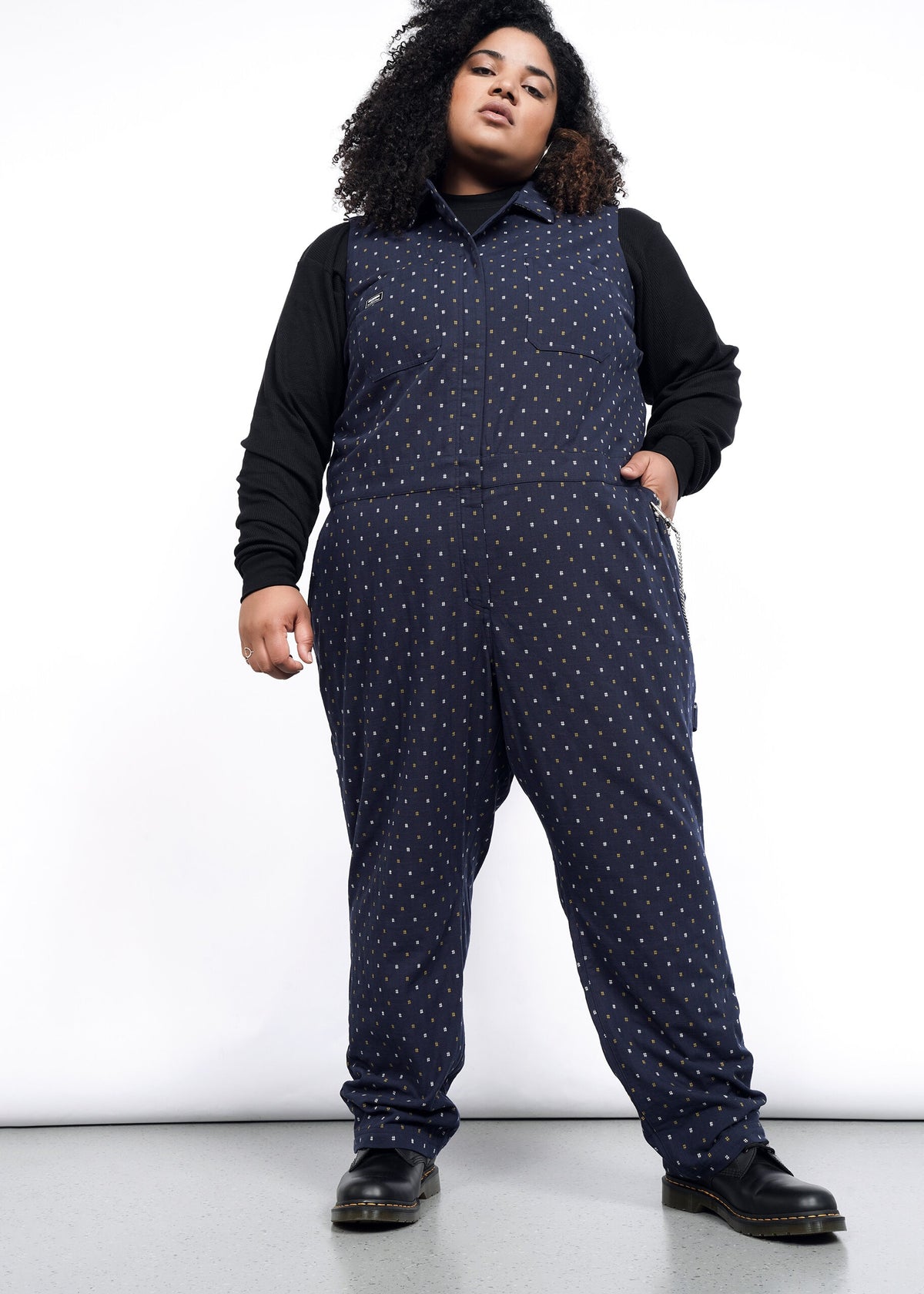 Model wearing The Essential Sleeveless Coverall in Hashtag Navy