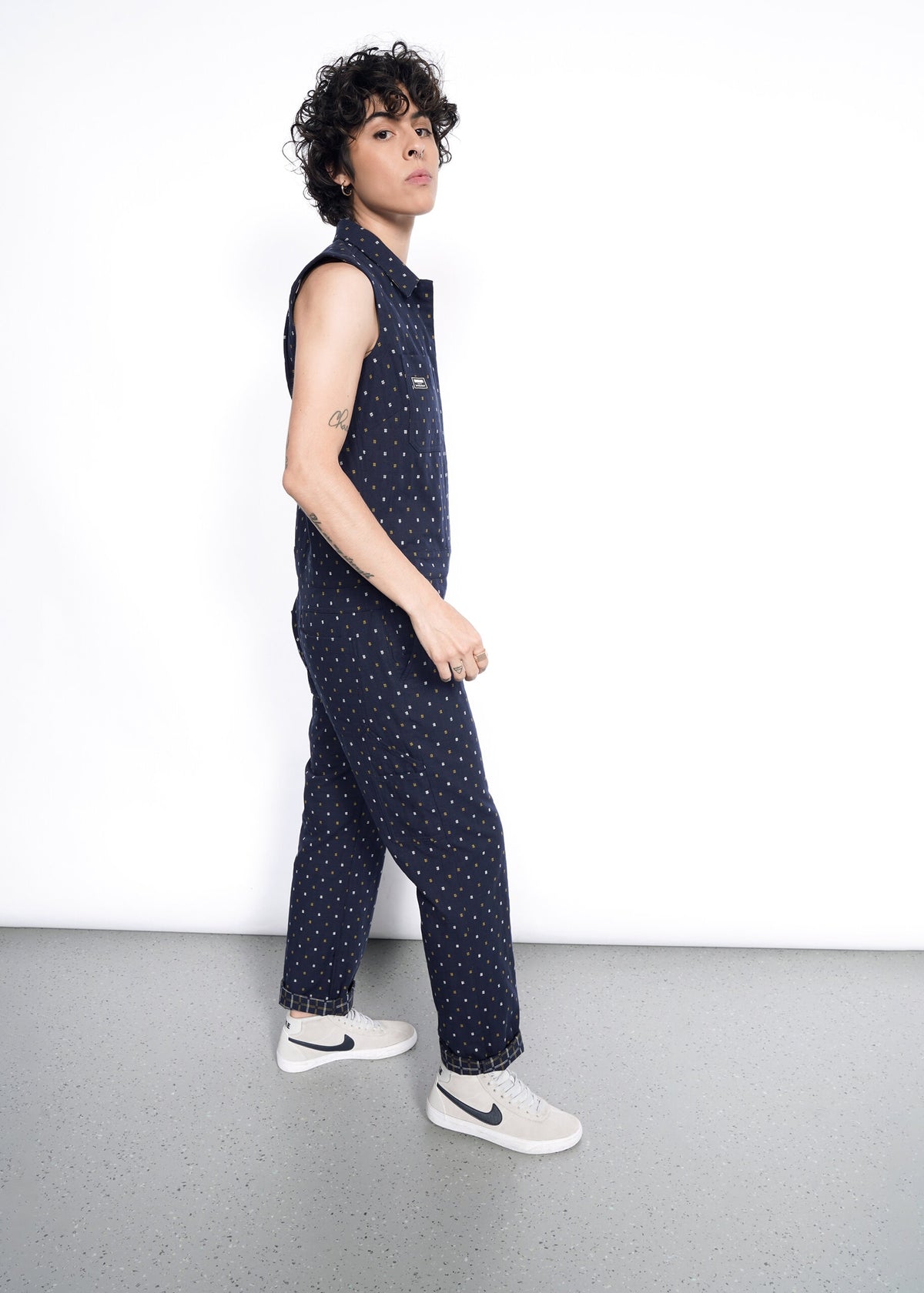 Model wearing The Essential Sleeveless Coverall in Hashtag Navy