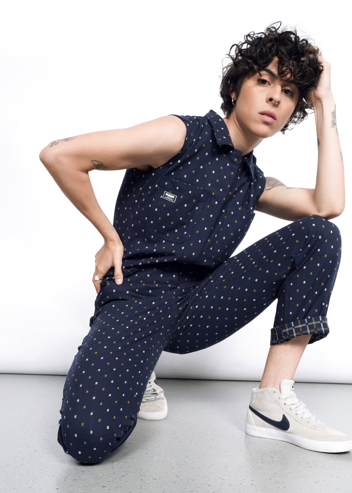 Model wearing The Essential Sleeveless Coverall in Hashtag Navy