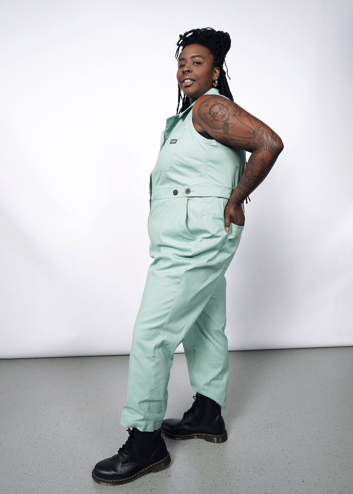 Model wearing The Essential Sleeveless High Waisted Coverall in Sage