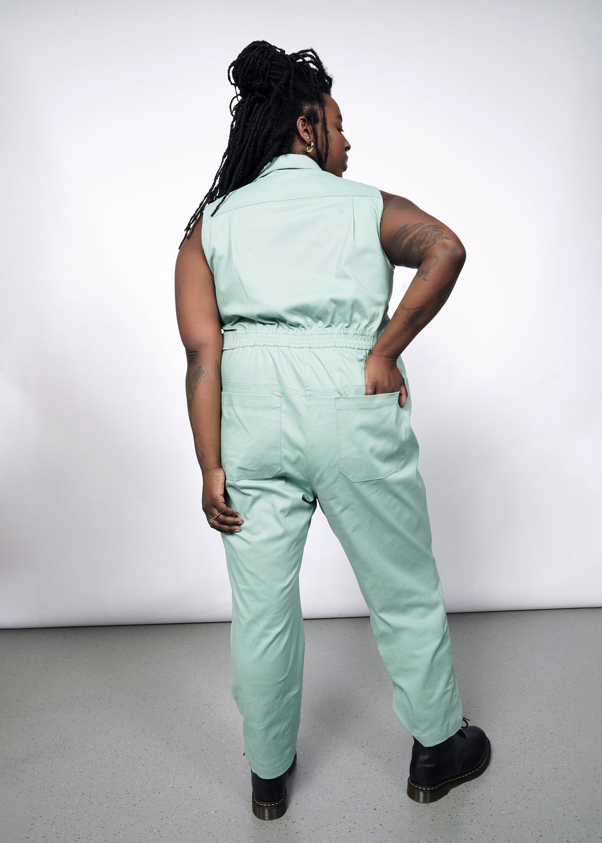 Model wearing The Essential Sleeveless High Waisted Coverall in Sage