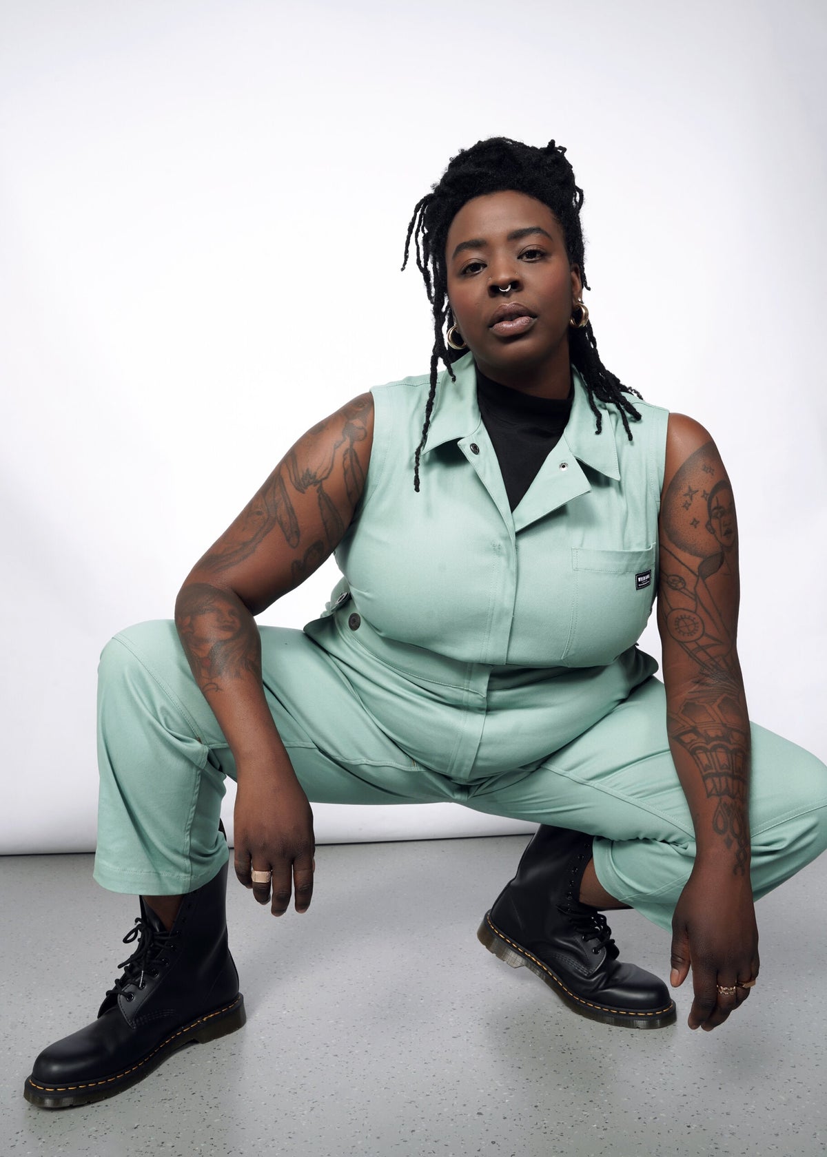Model wearing The Essential Sleeveless High Waisted Coverall in Sage