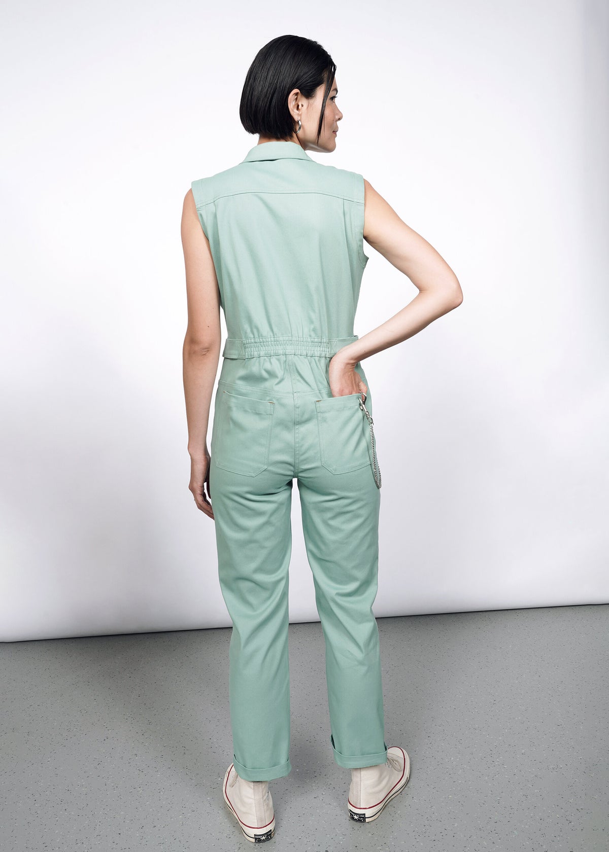 Model wearing The Essential Sleeveless High Waisted Coverall in Sage
